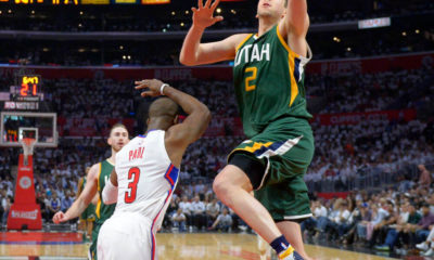 Utah Jazz forward Joe Ingles, right, of Australia, shoots as Los Angeles Clippers guard Chris Paul defends during the first half in Game 7 of an NBA basketball first-round playoff series, Sunday, April 30, 2017, in Los Angeles. (AP Photo/Mark J. Terrill)