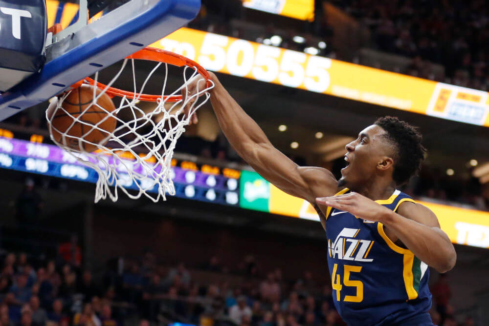 Utah Jazz guard Donovan Mitchell (45) dunks in the second half during an NBA basketball game against the Los Angeles Lakers Saturday, Oct. 28, 2017, in Salt Lake City. (AP Photo/Rick Bowmer)