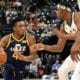 Mar 7, 2018; Indianapolis, IN, USA; Utah Jazz guard Donovan Mitchell (45) drives to the basket against Indiana Pacers center Myles Turner (33) during the fourth quarter at Bankers Life Fieldhouse. Mandatory Credit: Brian Spurlock-USA TODAY Sports